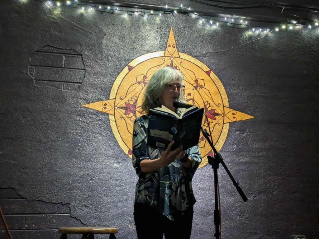 "Blue Mountain Rose" author Julie Hammonds reads from her book.